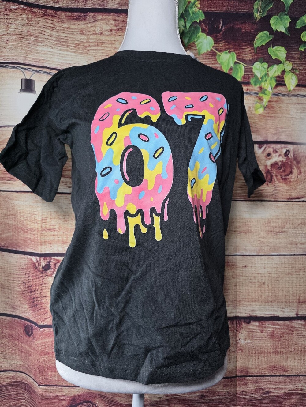 NWOT Black Graphic Tee with Pink & Blue Dripping '67' Design